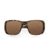 Sunglasses with tortoiseshell frame and brown lenses on a white background